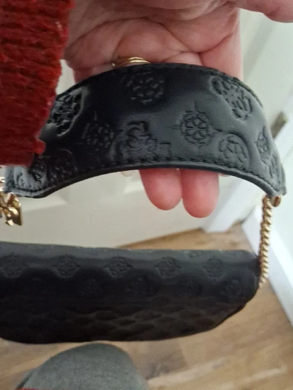 GUESS Black Embossed Leather Shoulder Bag with Gold Chain and Charm Accent